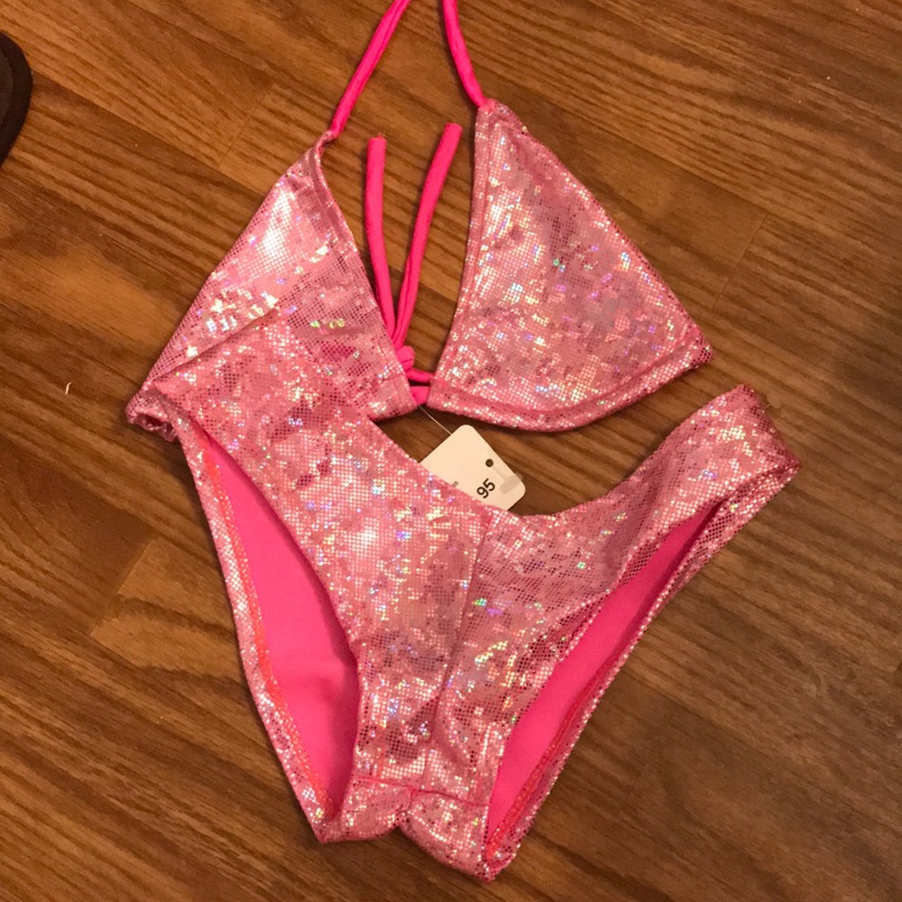 Pink holographic dance outfit.